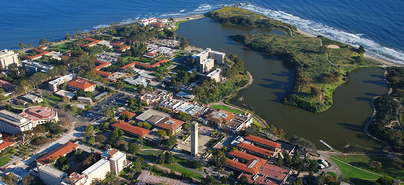 This is an image of UCSB from the aerial view. It is beautiful. The ocean surrounds it.